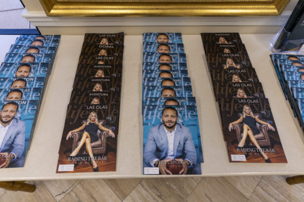 Stacks of magazines are arranged on a table, featuring "Men of Influence 2025" and "Women of Influence" editions. The covers showcase a man in a blue suit and a woman in a black dress, with titles like "Las Olas" and "Aventura. Lifestyle