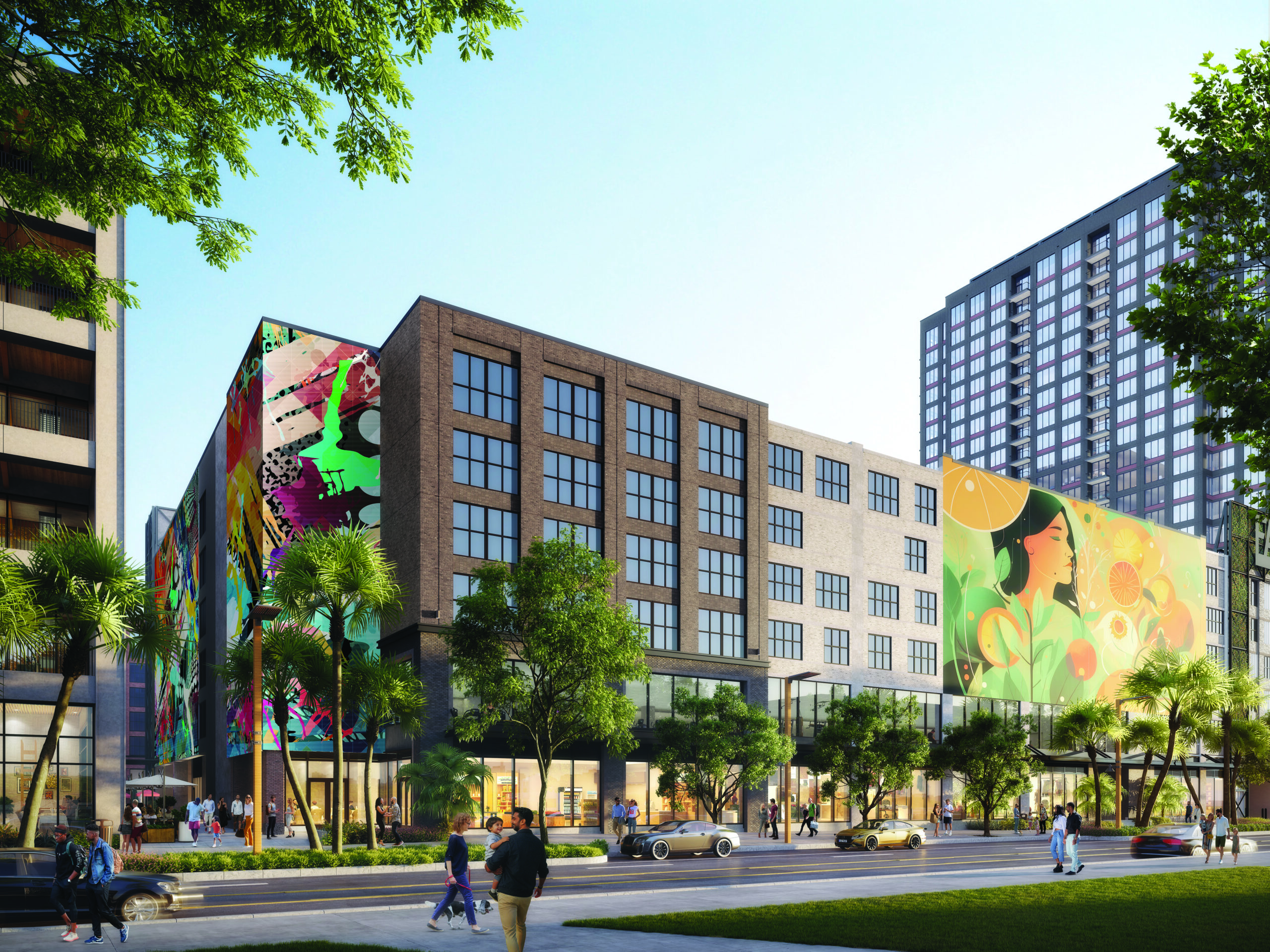 A modern city street in Fort Lauderdale’s art district, with people walking, trees lining the sidewalk, and tall buildings featuring colorful murals—like a woman with flowers and another abstract piece—inspired by Fat Village. Cars are parked along the road. Lifestyle